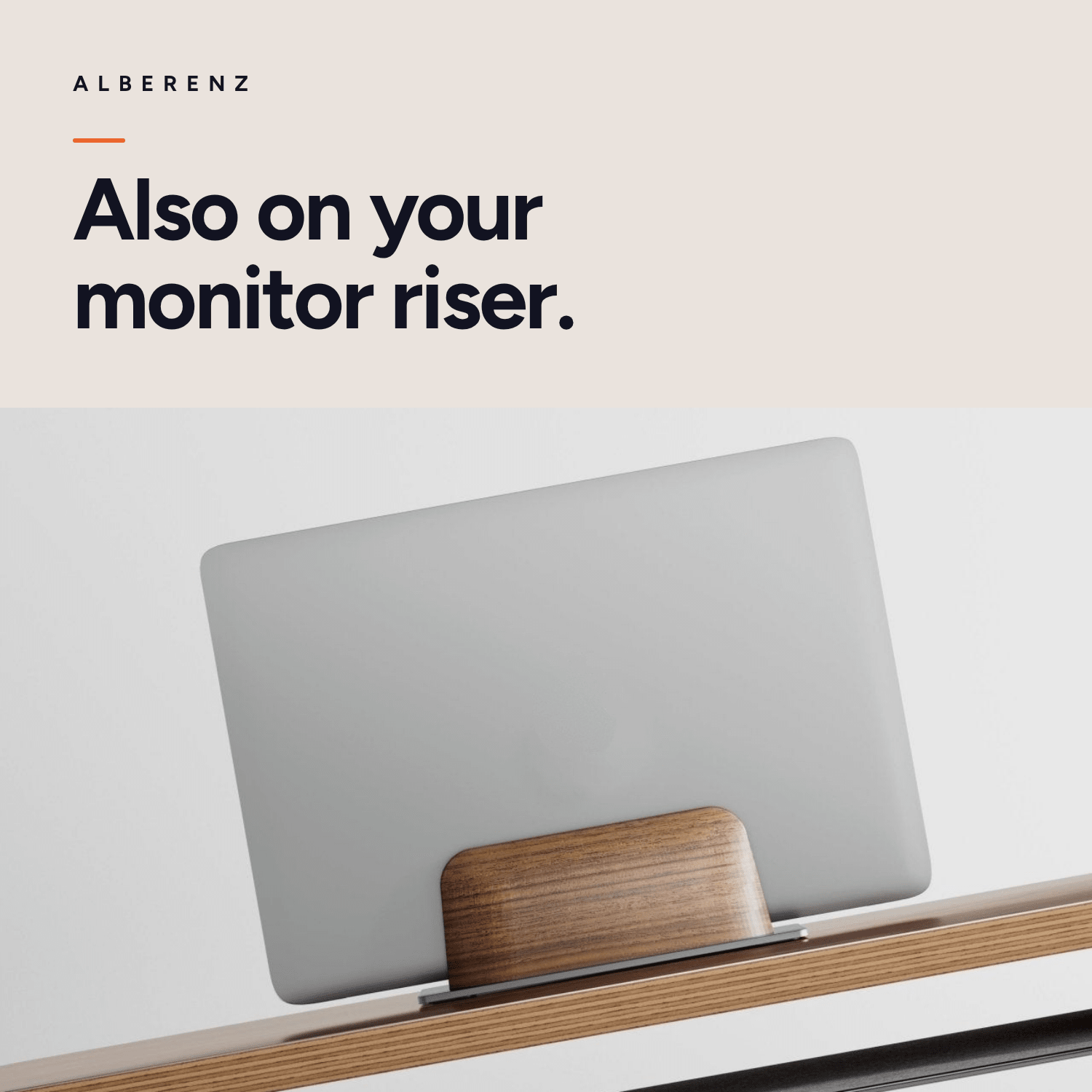 Alberenz vertical laptop stand in walnut: on top of a walnut monitor riser